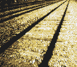 A 4-colour pixelated picture of a railroad track