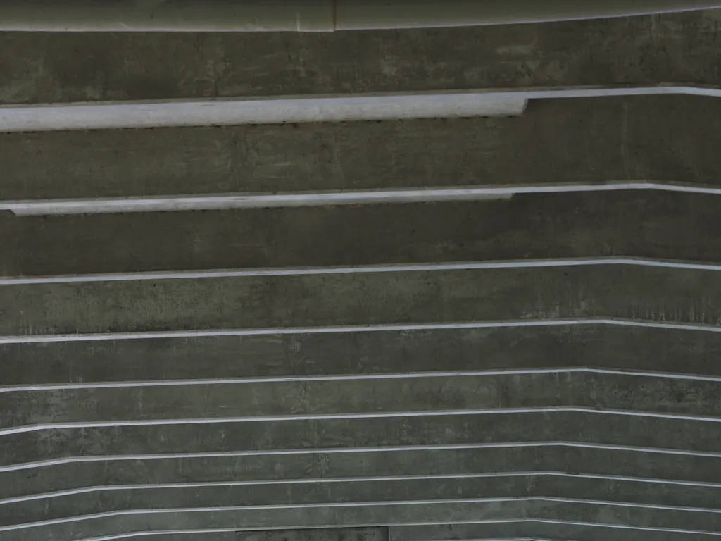 the concrete underside of a bridge
