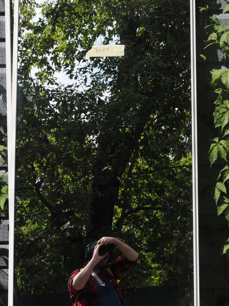 a selfie in a large mirrow