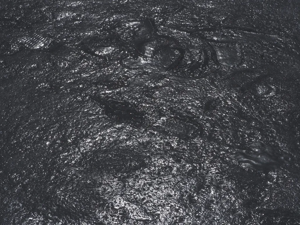 footprints in refrozen ice