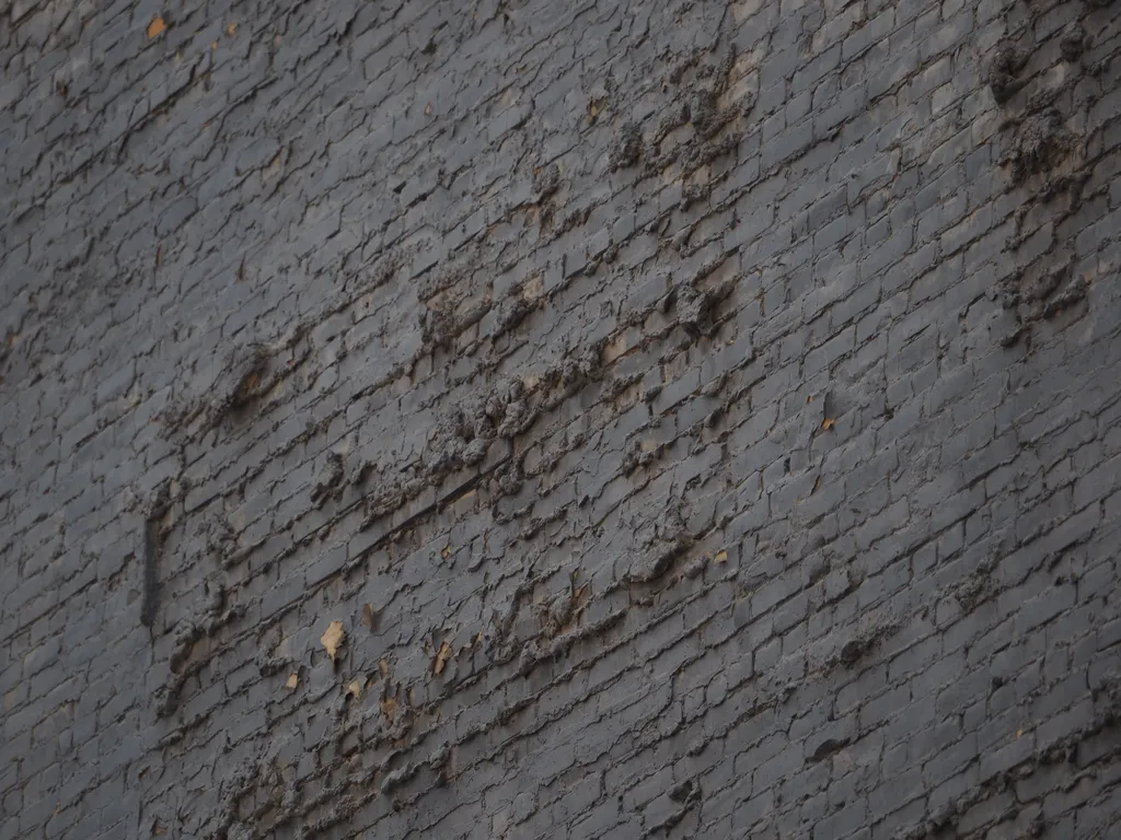 an uneven brick wall