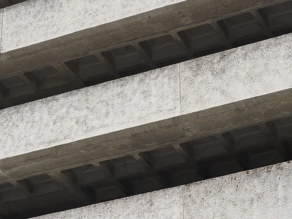 the patterned roof of a parking garage