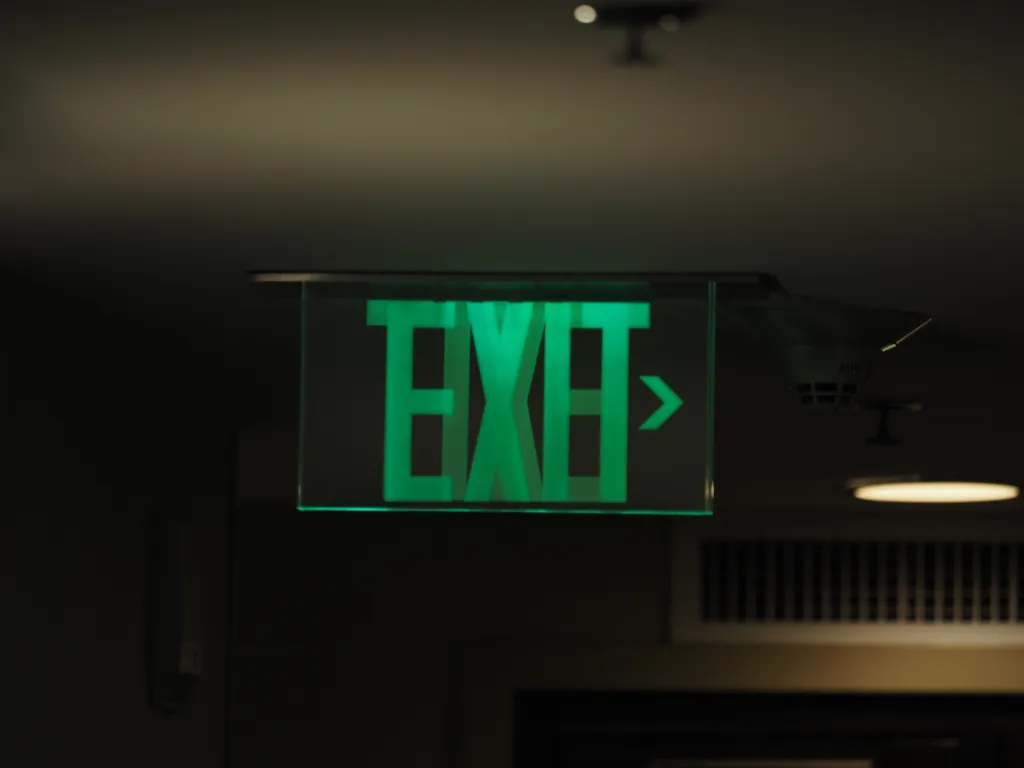 an unreadable exit sign