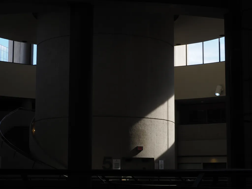 a large concrete pillar in a building