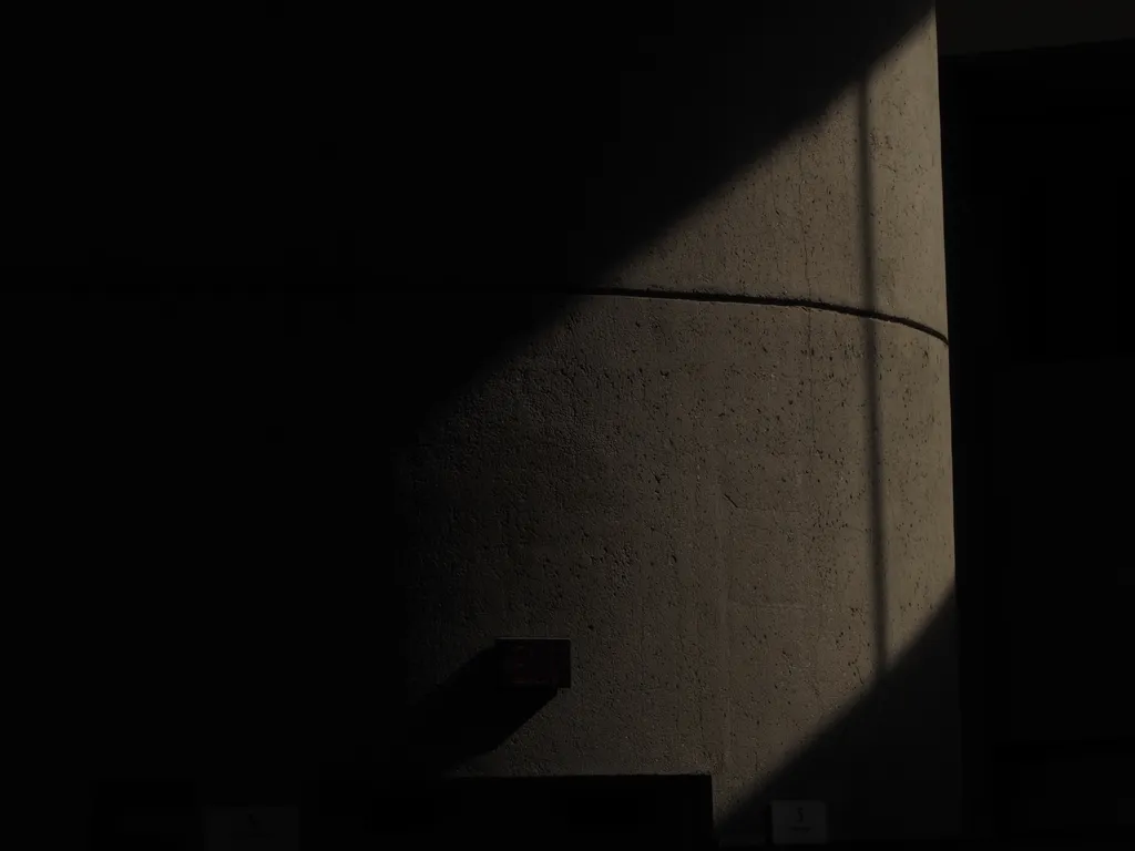 a concrete pillar in a building