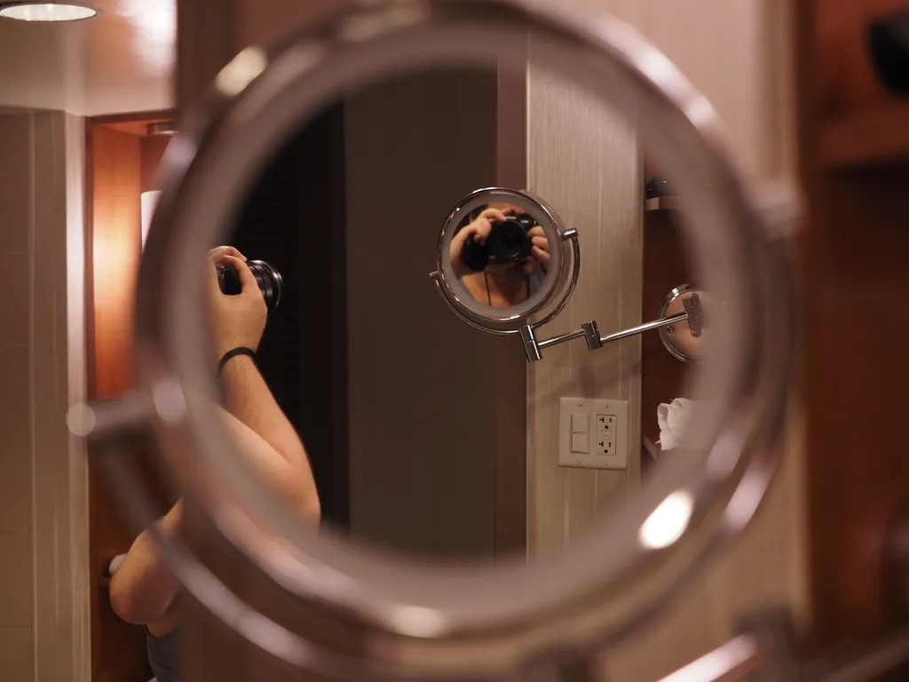 a selfie in a mirror as viewed from that same mirror