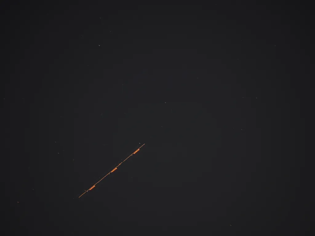 the streak of a plane at night