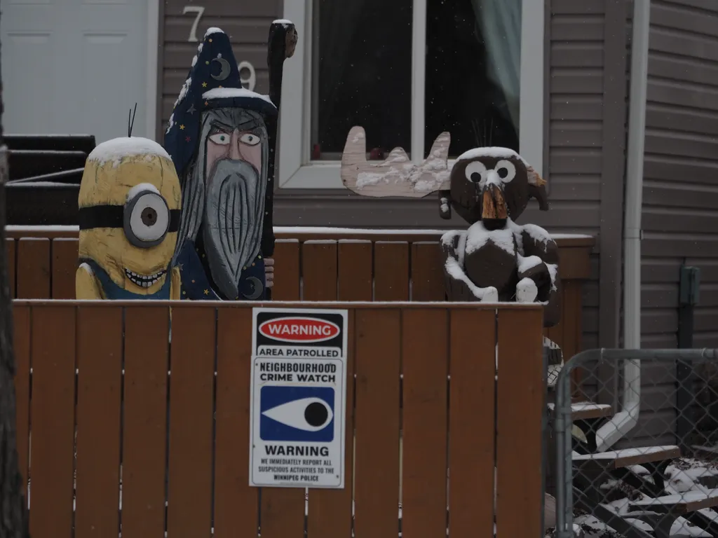 wooden sculptures, one broken