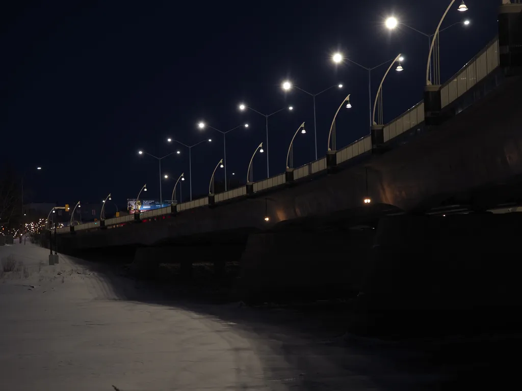 a bridge lit up at night